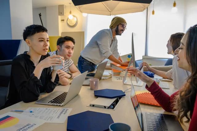 The Oyorox team collaborating around a table